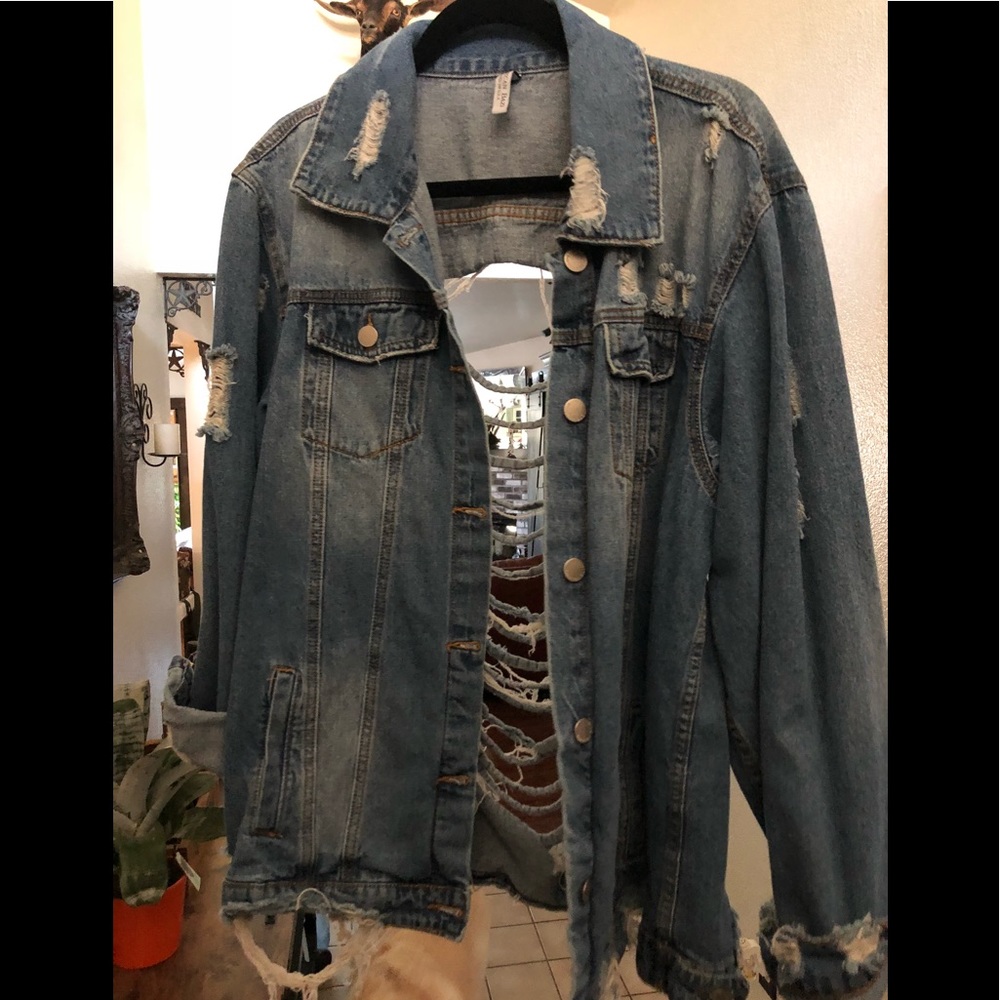 Forever 21 ripped boyfriend fit jean jacket.